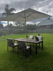 Outdoor dining setting includes a 3metre umbrella v