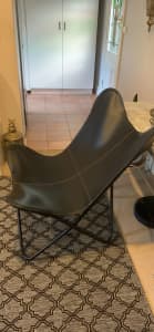 Designer leather chair with orange trim