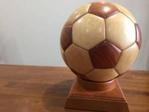 Wooden decorative soccer ball/money box with base