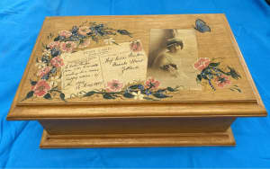 Vintage timber box with hand-painted floral design.