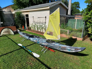 Fibreglass sea kayak with sail