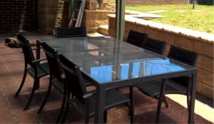 Outdoor Furniture - 8 chairs and glass table