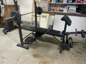 Adjustable bench with bar