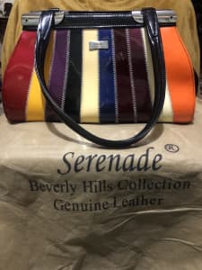 Serenade Genuine Leather Patent Colourful handbag looks as New.