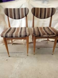 A pair of genuine Parker dining chairs