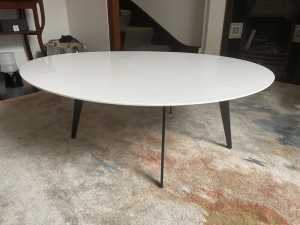 White coffee table with metal legs