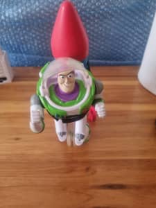 BUZZ LIGHTYEAR ANIMATED TOY WITH ROCKET. COLLECTABLE.