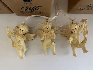 New AVON collectable cherub set..REDUCED..$15 the lot