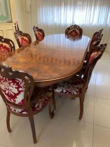 Dining table, 8 chairs and display unit.