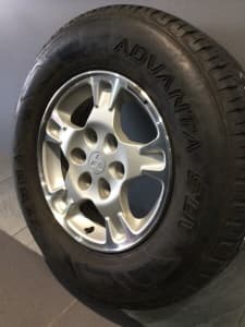 MITSUBISHI PAJERO EXCEED NM NP 16" GENUINE ALLOY WHEELS AND TYRES