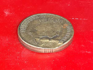 Un-dated coin. One of a kind, mint made defect.