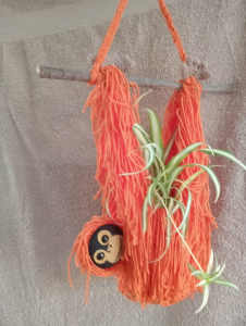 Hand crafted Orangutan plant hangers with pot and plant