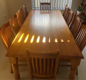 11 Piece timber dining table and chairs