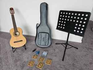 Guitar, case, guitar stand, music stand, replacement strings, tuner 