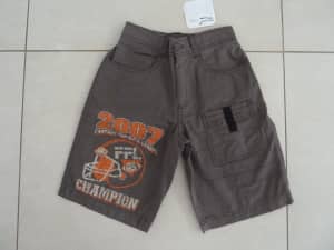 Boys: Brown Shorts with image on front. Size: 6yrs. NEW with ticket.