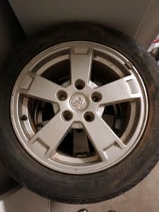 Genuine Holden 16 inch alloy wheels tyres not the best .