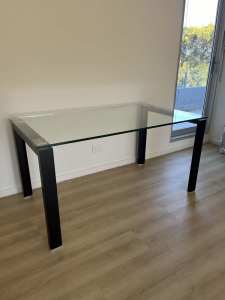 Glass top table - solid 15mm glass. Looks great!