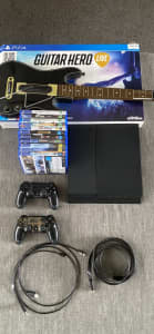 Sony PlayStation 4 with 10 games and 2 controllers