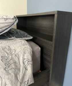 Single bed with book end storage 