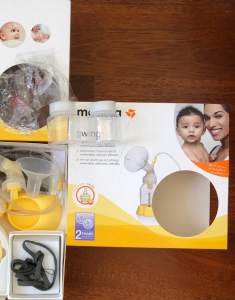 Medela electric pump and bottle warmer and breast pads and so on