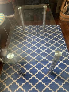 Glass table with chrome legs