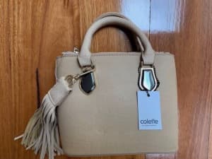 Brand New (with tags) Colette Hayman tan mini bag