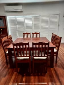 Dining Table & 8 Chairs Setting.