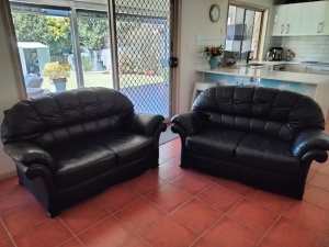 2 x 2.5 Seater Janda Black Leather Lounges