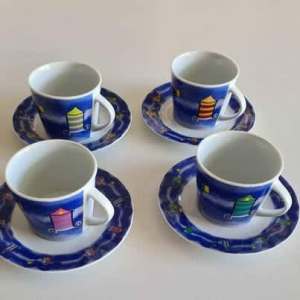 Set of 4 Porcelain Coffee Cups & saucers.