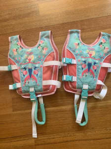 Two Wahu swim vests, size M and S