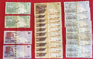 Qatari Riyal currency: 218 riyal Worth approximately $95 AUS