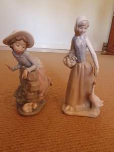 2 NAO Ladro porcelain figurines