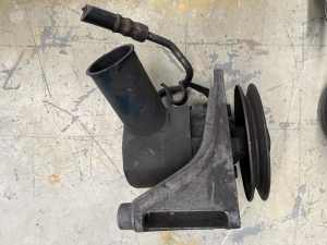Ford Cleveland power steering pump and bracket.