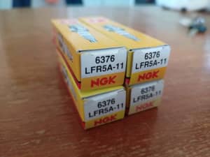 Set of four NGK spark plugs 