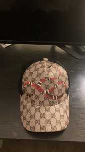 beige gucci snake hat