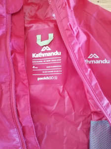 Size 4 years Katmandu Pack and Go red waterproof jacket.