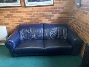Large blue leather couch