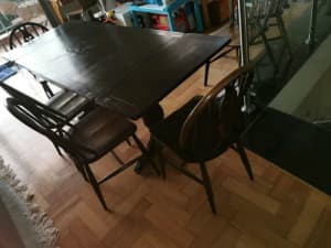 Ercol extendable solid wood dining table all chairs sold
