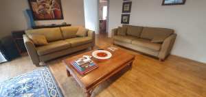 Comfortable 3 Seater Lounge Set of Two and coffee table