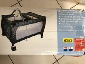Portable baby cot - never used still in box