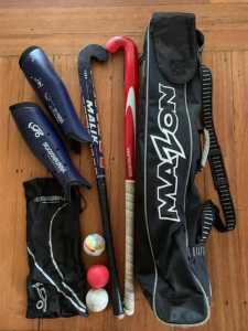 Hockey sticks, bag, balls and leg guards