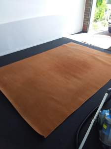 Floor Rug, burnt orange colour