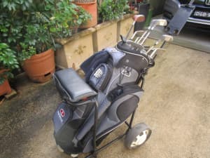 Golf clubs, bag and buggy - at a starters price