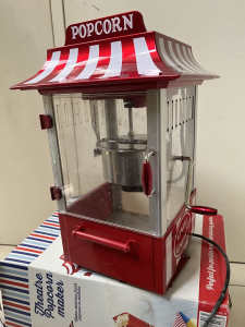 Theatre popcorn maker. Party. Red and white striped.