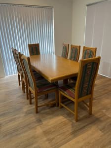 Large family oak dining table with 8 chairs