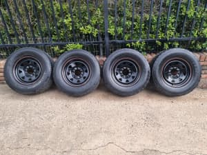 Set of 4x Landcruiser 17 inch AT Sunraysia Rims Tyres 60% tread