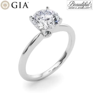Four Prong Solitaire Diamond Engagement Ring in White Gold