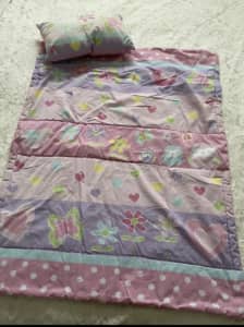 Cot quilt with cushion
