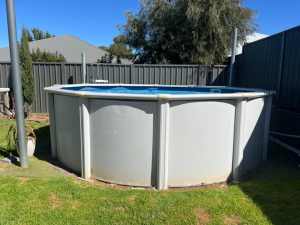 Above ground pool with sand filter