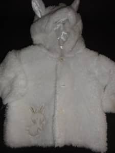 Size 00 Fluffy jacket brand new condition. 